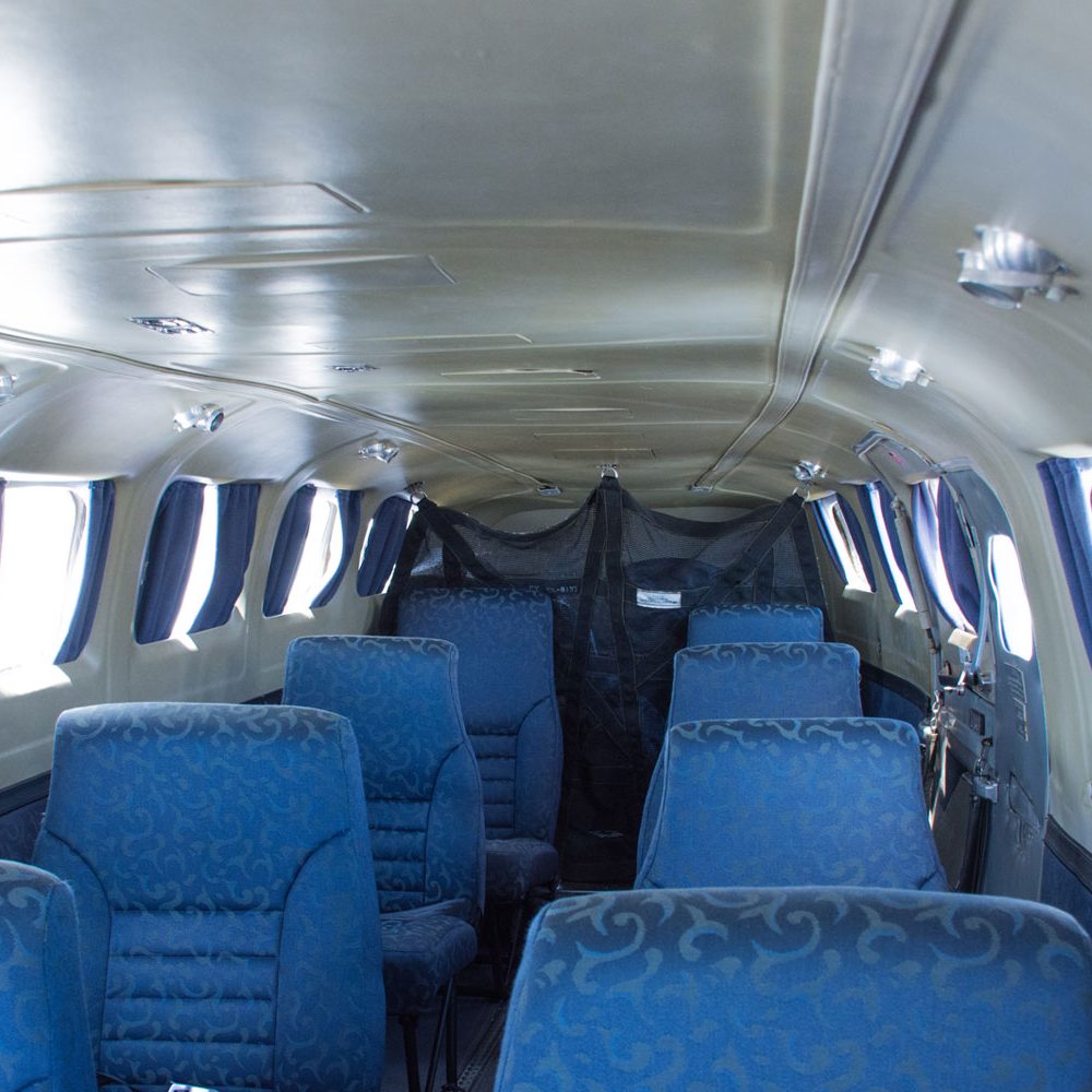 Looking down the aisle of the plush seats